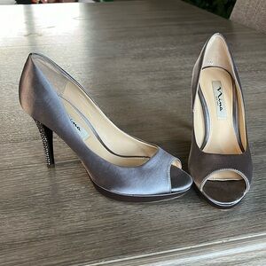 Silver open toe pumps